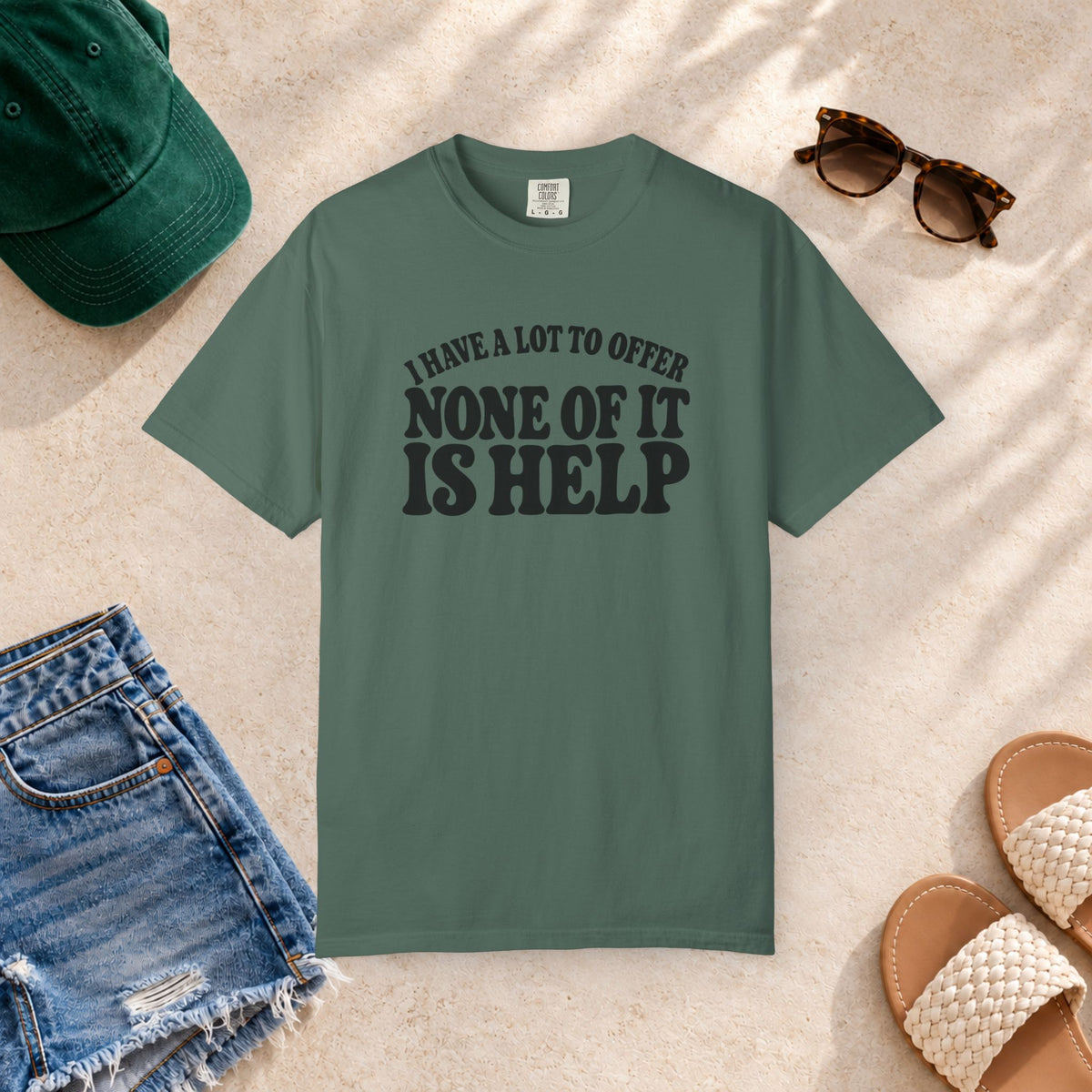 Comfort Colors T-shirt with bold retro “I Have a Lot to Offer, None of It Is Help” lettering