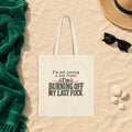 I'm Burning Off My Last Fuck Canvas Tote Bag in Natural, 15" x 16"