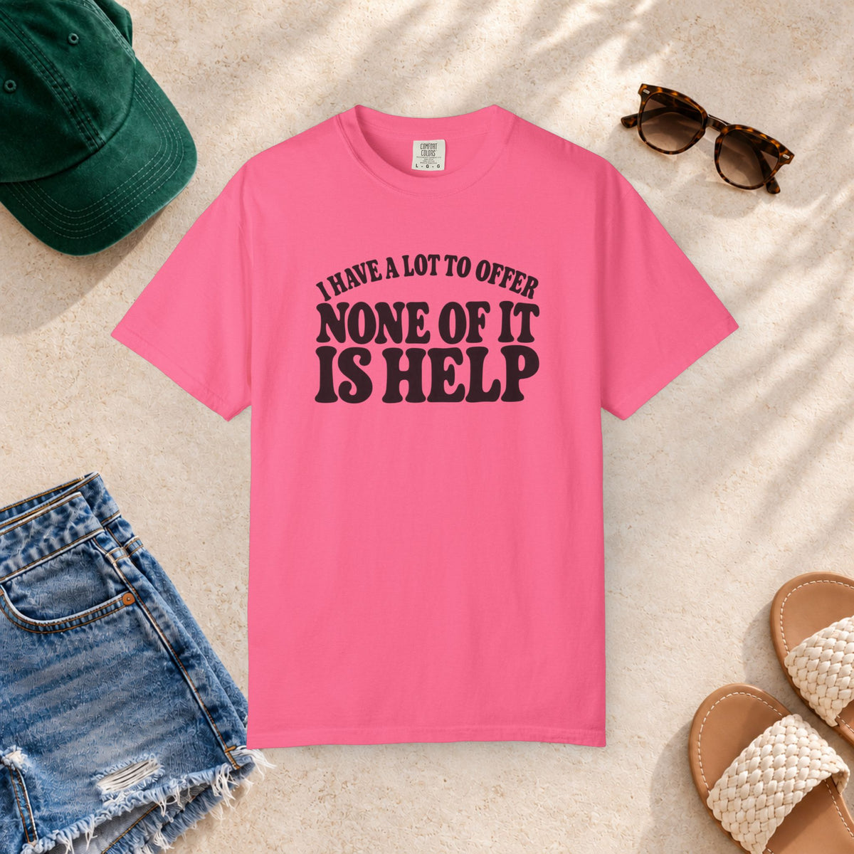 Comfort Colors T-shirt with bold retro “I Have a Lot to Offer, None of It Is Help” lettering