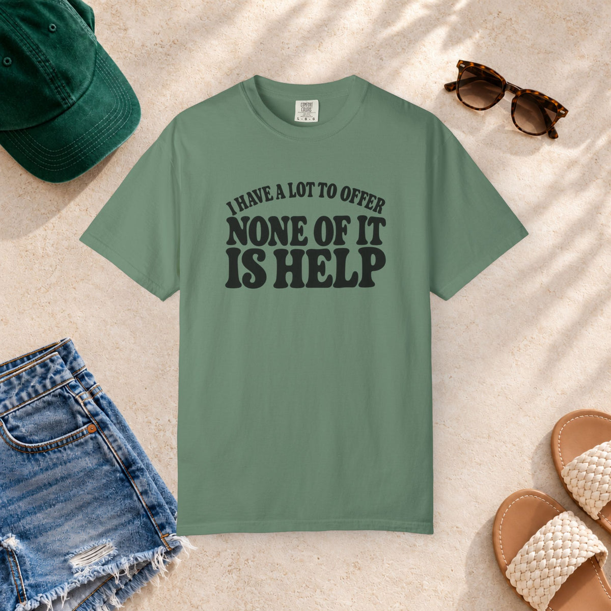 Comfort Colors T-shirt with bold retro “I Have a Lot to Offer, None of It Is Help” lettering