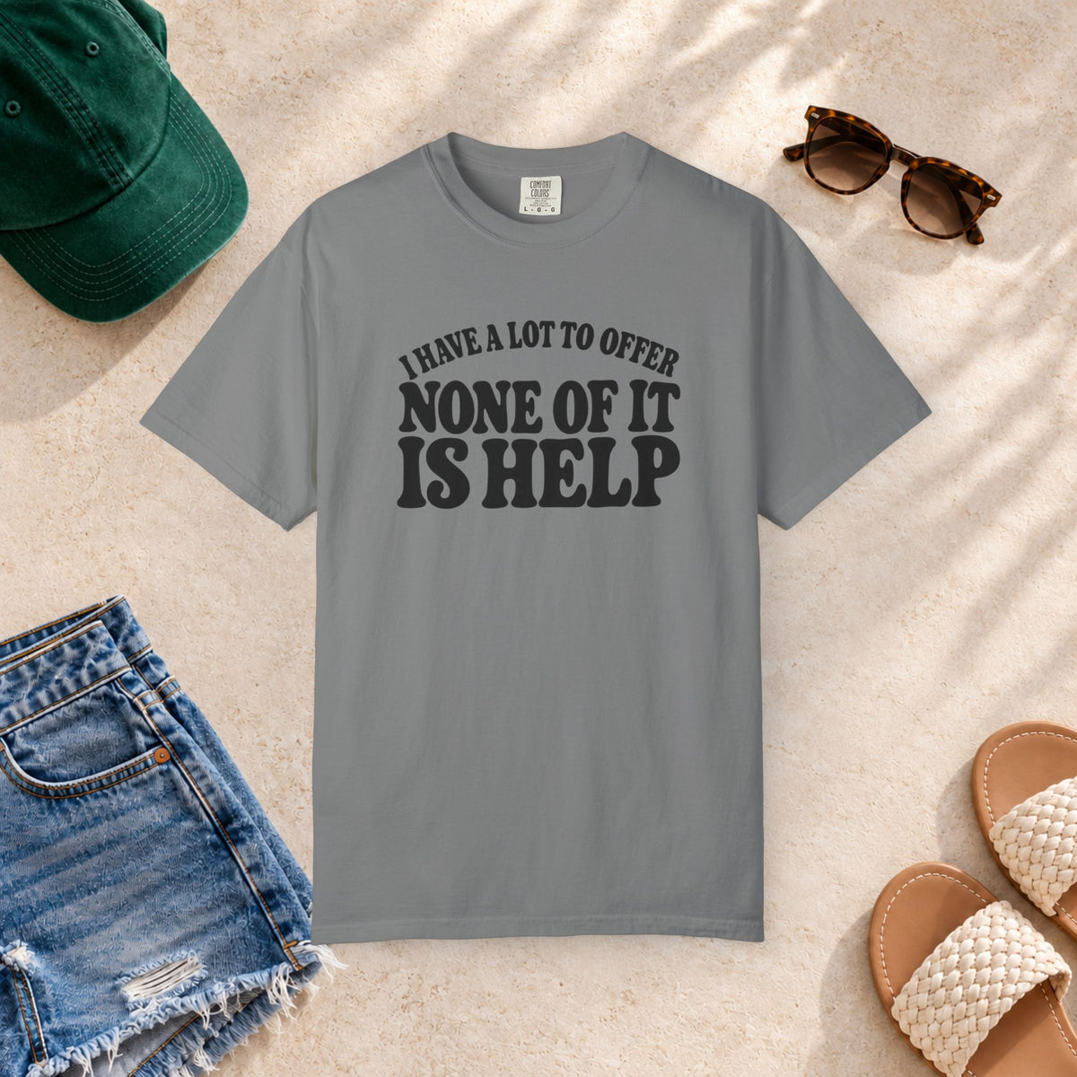 Comfort Colors T-shirt with bold retro “I Have a Lot to Offer, None of It Is Help” lettering