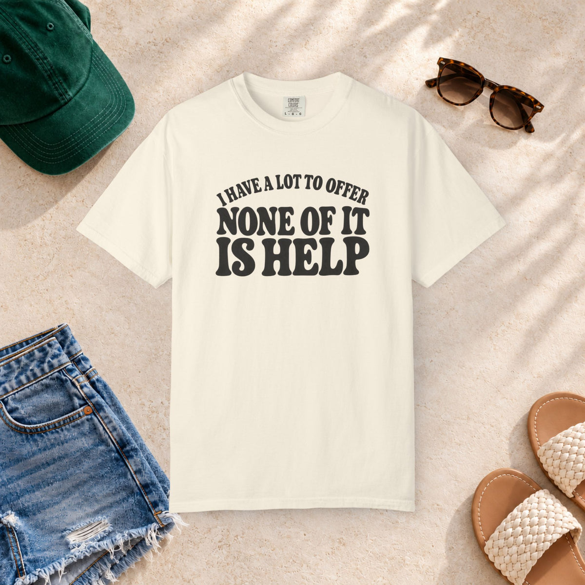 Comfort Colors T-shirt with bold retro “I Have a Lot to Offer, None of It Is Help” lettering