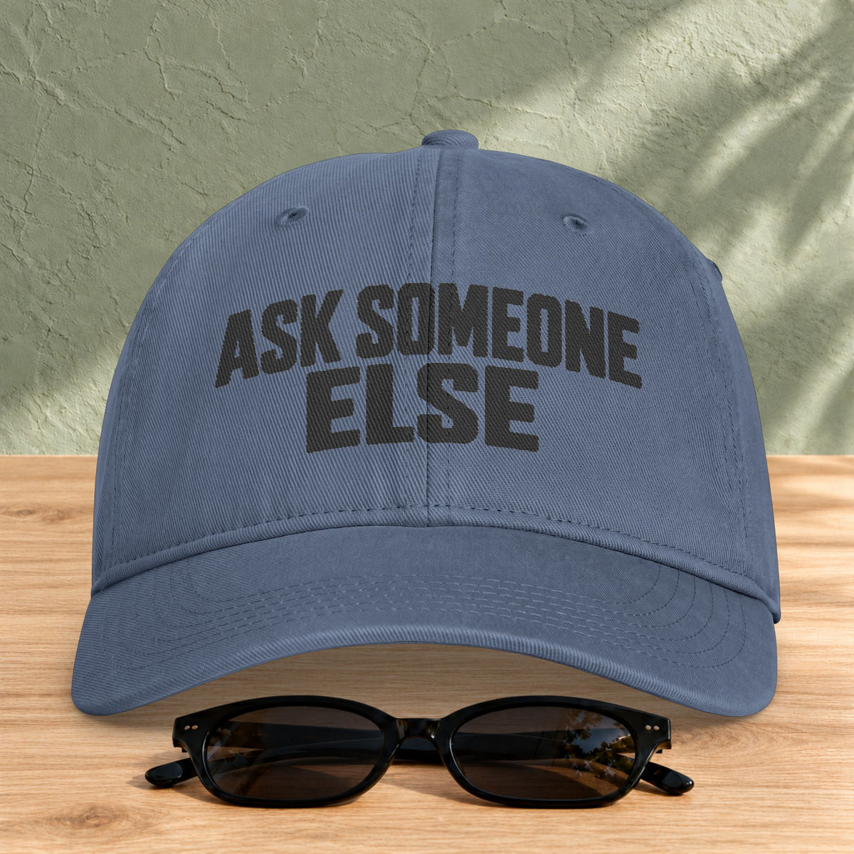 Ask Someone Else washed cap in Blue Jean, front view with slogan lettering