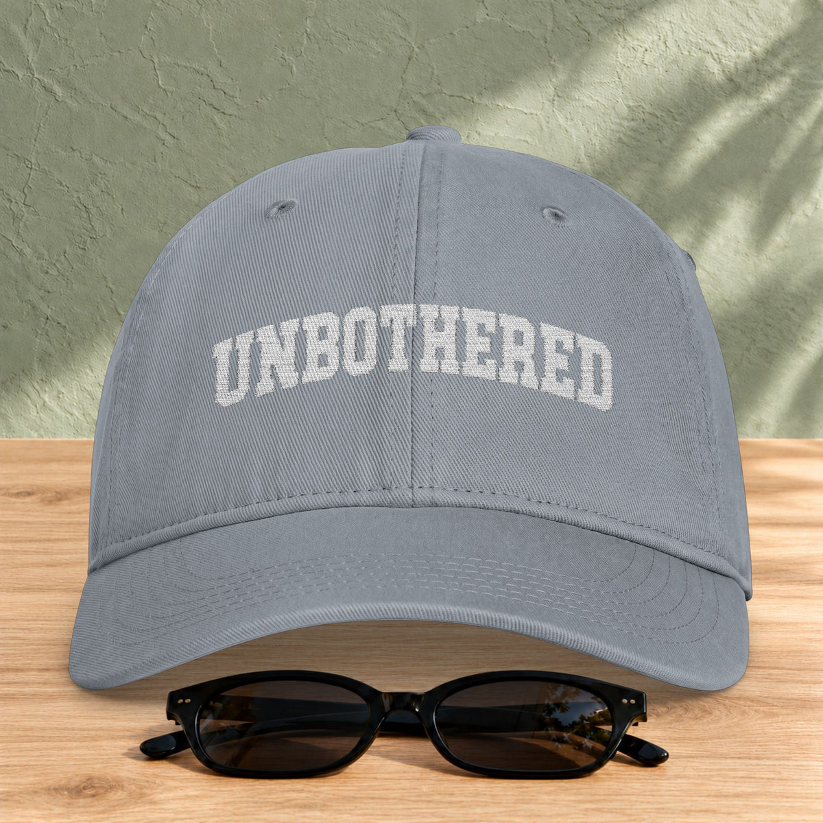 Unbothered Embroidered Washed Cap in Granite — product view