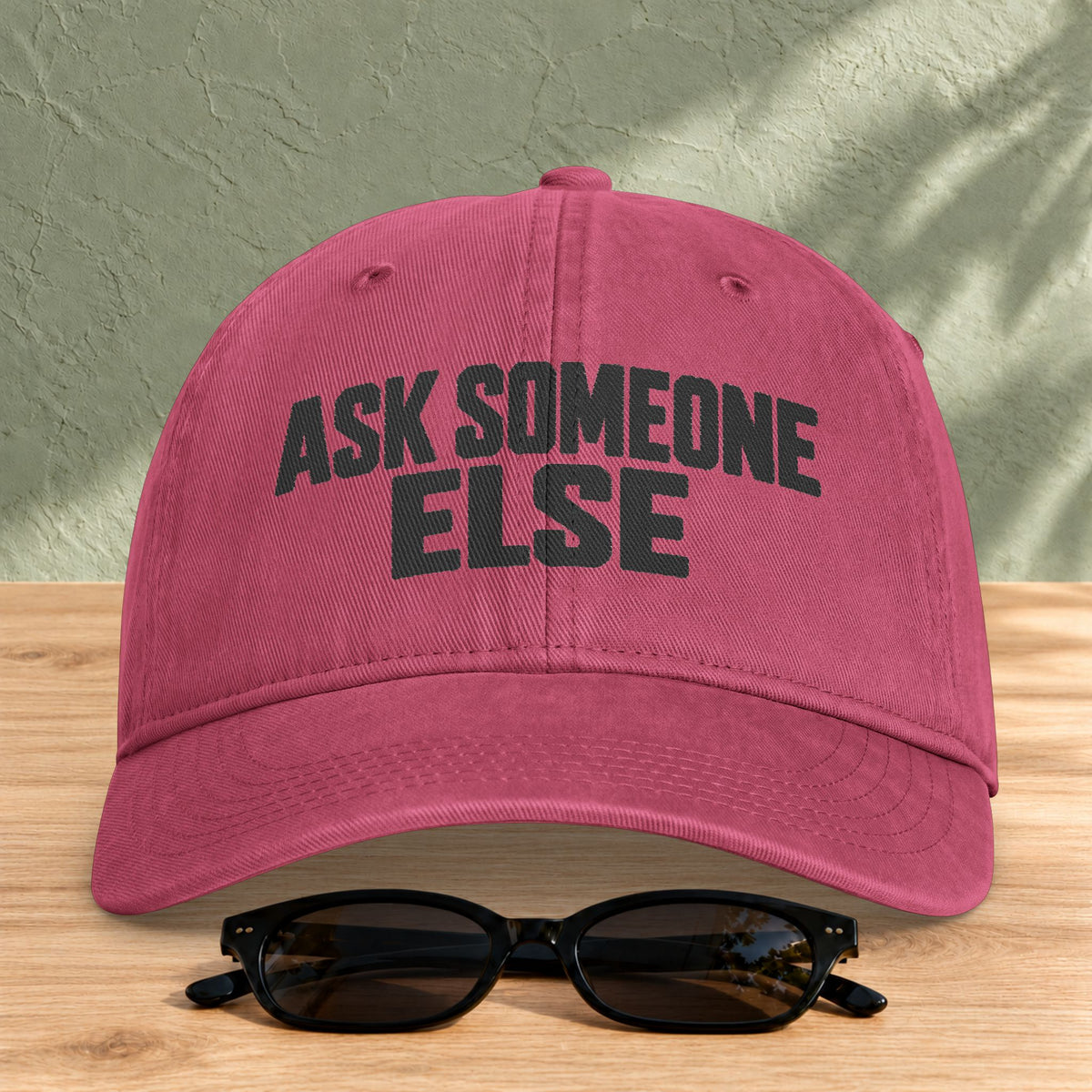 Ask Someone Else washed cap in Crimson, front view with slogan lettering