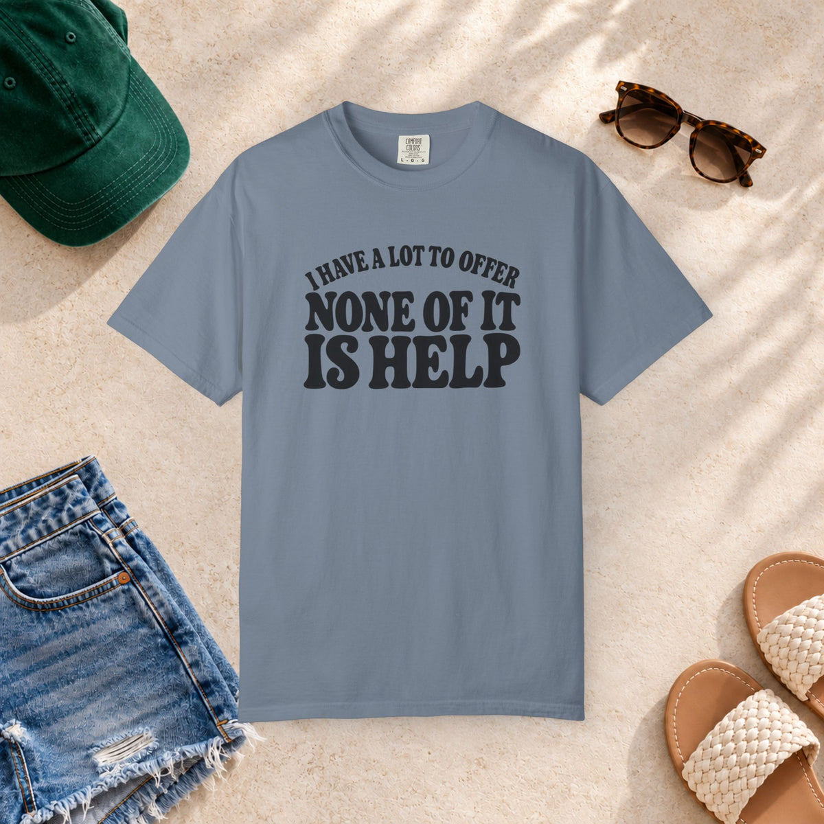 Comfort Colors T-shirt with bold retro “I Have a Lot to Offer, None of It Is Help” lettering