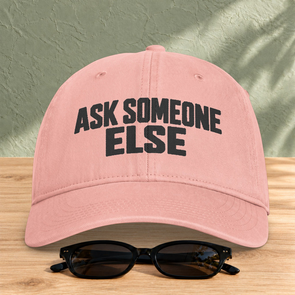 Ask Someone Else washed cap in Peachy, front view with slogan lettering