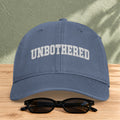 Unbothered Embroidered Washed Cap in Blue Jean — product view