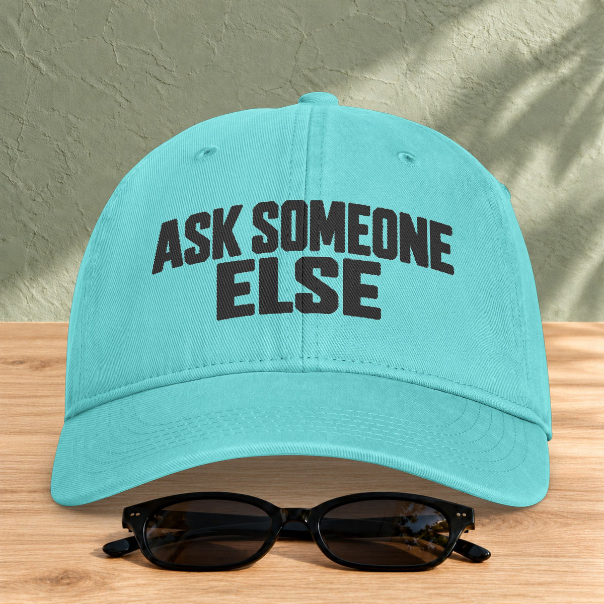 Ask Someone Else washed cap in Chalky Mint, front view with slogan lettering